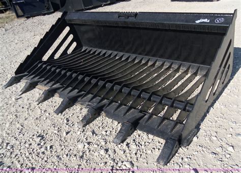 heavy duty skid steer rock bucket|skid steer rock bucket attachment.